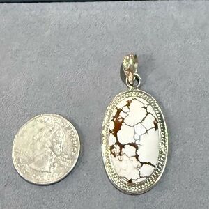 Wild Horse and sterling silver pendant